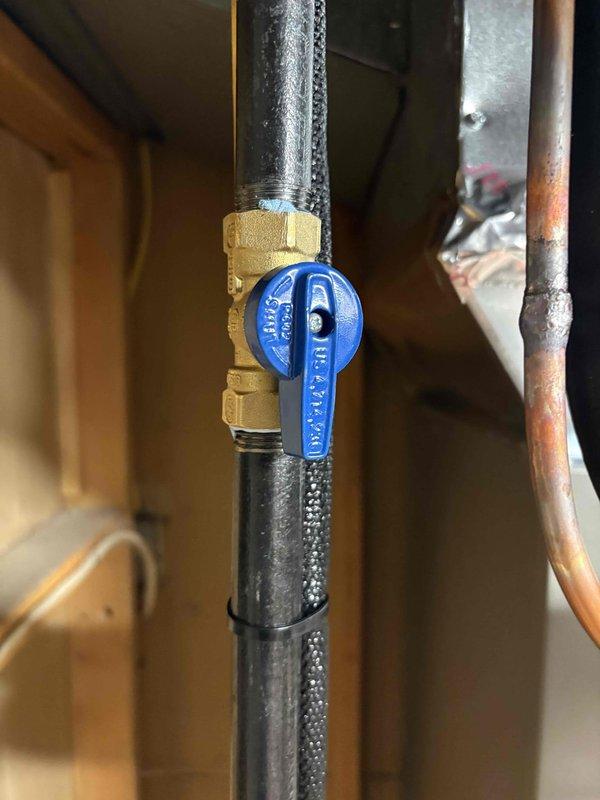 Completed full HVAC system installation including an 80% efficiency furnace and air conditioning unit in basement location. Due to water issues in the basement, elevated the furnace on a platform box to protect equipment from potential flooding. Installation included proper ductwork configuration with metal supply and return plenums, copper refrigerant line set connecting outdoor condensing unit to indoor coil, gas supply line with ball valve shutoff, condensate drainage system, and electrical connections. All components mounted securely to structural framing with appropriate clearances maintained for service access and code compliance.