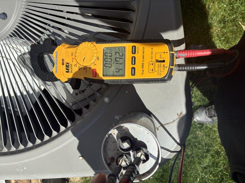 Replaced failed capacitor on outdoor condensing unit and performed evaporator coil cleaning service. Tested system operation with digital multimeter to verify proper electrical readings and confirmed all connections were secure. Unit returned to normal cooling operation with improved airflow efficiency following evaporator wash.