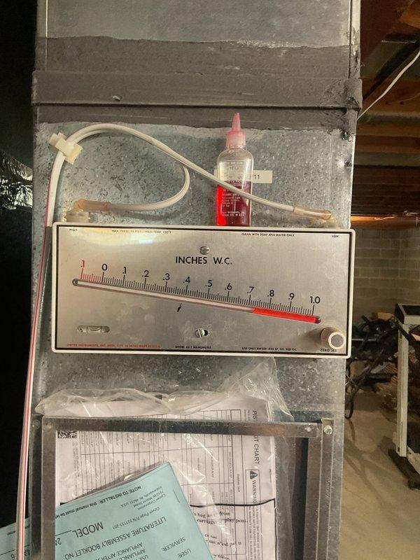 Completed MVP cooling maintenance visit on 5-year-old system. Performed comprehensive inspection of HVAC equipment, checked system pressures as indicated by pressure gauge reading, verified air filter condition and proper installation within air handler unit. All components found operating within normal parameters and system functioning properly.
