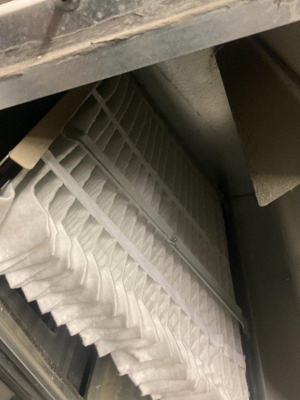Completed MVP cooling maintenance visit on 5-year-old system. Performed comprehensive inspection of HVAC equipment, checked system pressures as indicated by pressure gauge reading, verified air filter condition and proper installation within air handler unit. All components found operating within normal parameters and system functioning properly.