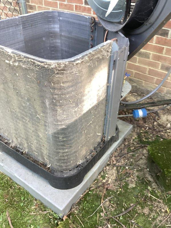 Completed MVP cooling maintenance visit on 7-year-old system. Performed standard inspection of outdoor condensing unit, noting significant exterior weathering, dirt accumulation, and surface oxidation on cabinet panels. Verified refrigerant lines, service valves, and condenser coil condition. Unit operational with no immediate mechanical concerns identified during visual assessment.