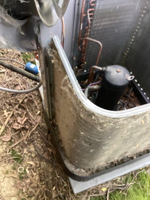 Completed MVP cooling maintenance visit on 7-year-old system. Performed standard inspection of outdoor condensing unit, noting significant exterior weathering, dirt accumulation, and surface oxidation on cabinet panels. Verified refrigerant lines, service valves, and condenser coil condition. Unit operational with no immediate mechanical concerns identified during visual assessment.