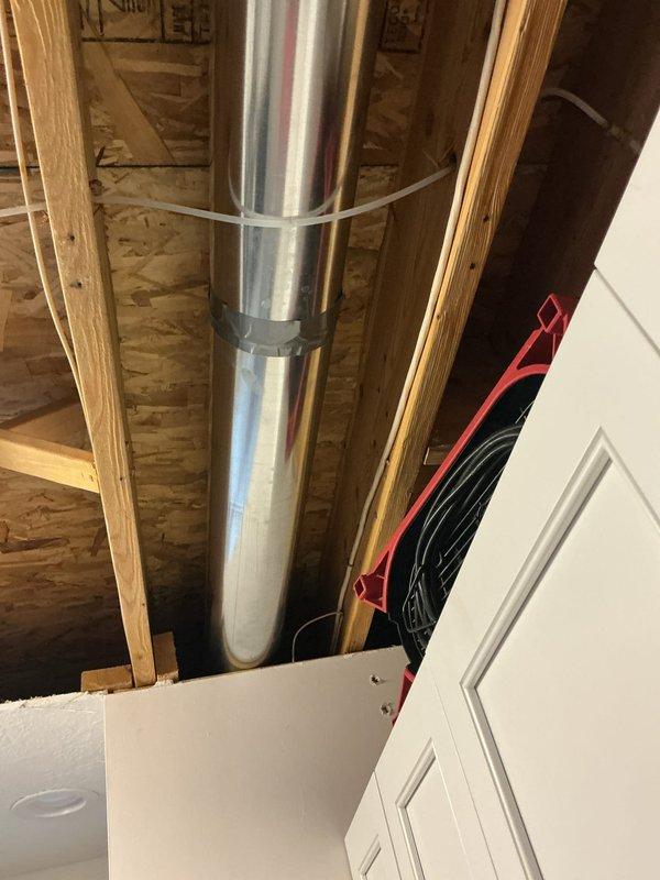 Responded to emergency service call for broken copper water line in kitchen ceiling. Upon arrival, confirmed copper pipe failure within ceiling cavity requiring immediate repair. Shut off water supply to affected area to prevent further water damage. Accessed damaged section through existing ceiling opening. Cut out failed copper line section and installed new copper piping using proper soldering techniques and fittings. Pressure tested repair to ensure no leaks. Verified water flow restoration to kitchen fixtures. Left ceiling access open as requested for customer's contractor to complete drywall repairs.
