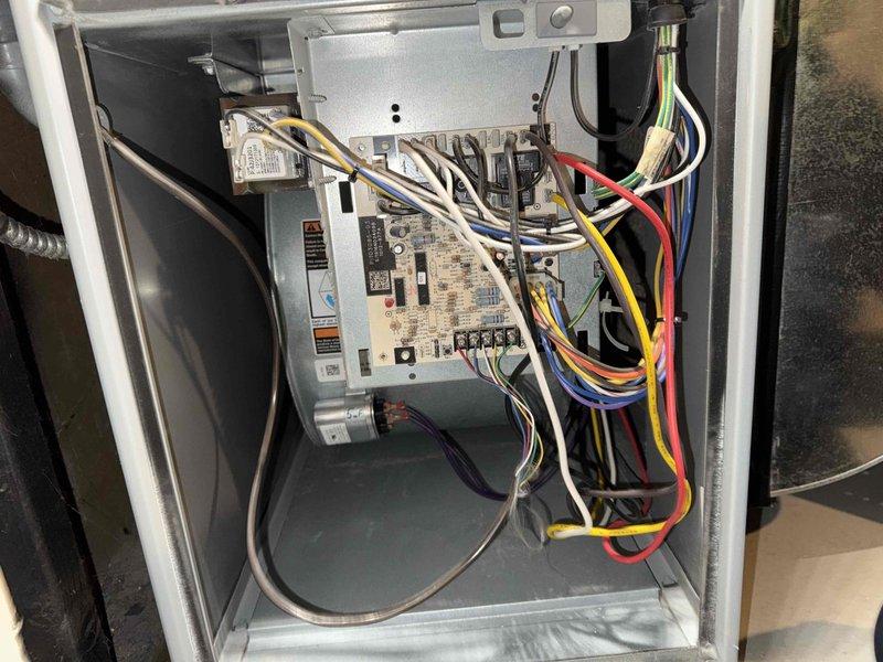 Completed scheduled MVP cooling maintenance visit on 9-year-old HVAC system. Performed comprehensive inspection of air handler unit including control board, electrical connections, and blower assembly. All wiring terminals, relays, and control modules verified secure and functioning properly. Noted minor surface rust on blower wheel fin requiring monitoring but not affecting current operation.