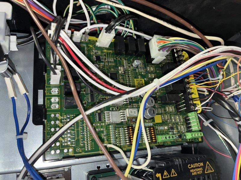 Completed scheduled air conditioning maintenance visit. Performed comprehensive system inspection including filter assessment and control board evaluation. Air filter showed moderate dust accumulation and discoloration, indicating normal usage patterns. Inspected electronic control panel and dual circuit boards, verifying all electrical connections, wire harnesses, and component integrity. All safety warning labels present and legible. System operational and functioning within normal parameters.