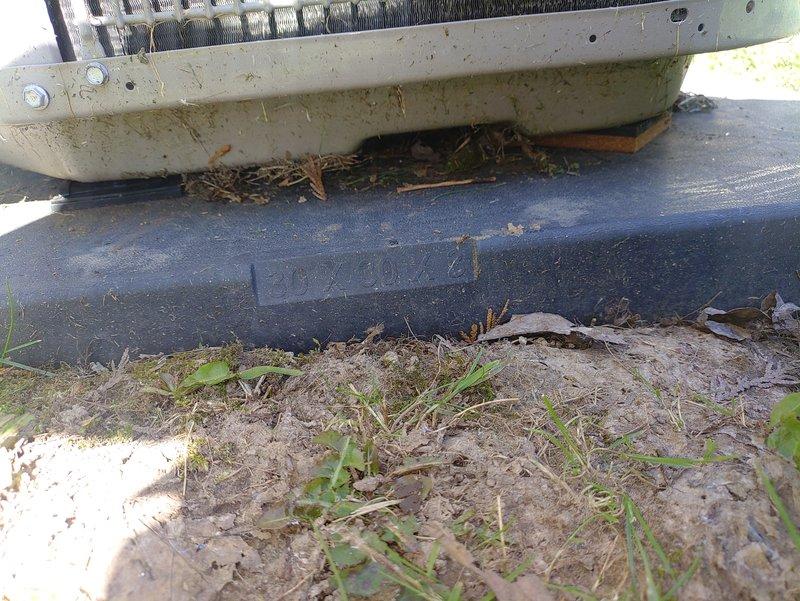 Responded to service call for unlevel 9-year-old air conditioning unit that had settled and was sinking on one side. Upon inspection, confirmed unit was significantly out of level using spirit level, with visible gap beneath the condenser pad where soil had compacted and eroded over time. Leveled and stabilized the outdoor condensing unit to ensure proper refrigerant oil return, prevent compressor damage, and restore optimal system operation.