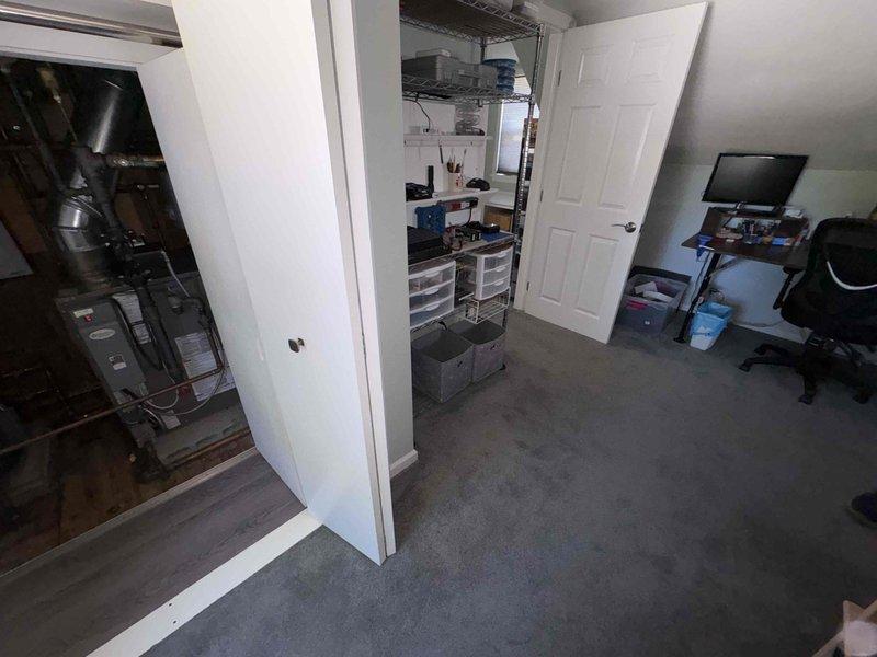 Conducted on-site assessment for mini split installation in residential property currently served by boiler heating system. Evaluated basement mechanical room and main living area, documented existing HVAC infrastructure and proposed installation locations, and captured photographic documentation of equipment placement areas for estimate preparation.