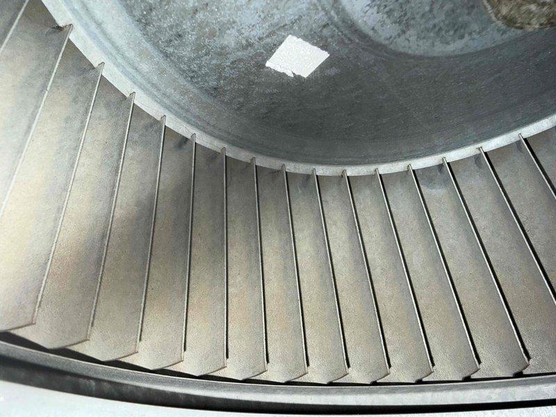 Completed preventive maintenance visit on Bryant HVAC system for MVP customer. Performed inspection of blower wheel assembly, which showed dust accumulation on central hub but otherwise clean blade surfaces, and verified proper operation of furnace and air handler components in basement mechanical room.
