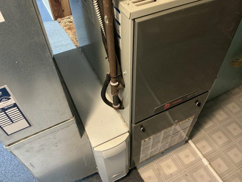 Conducted comprehensive HVAC system replacement estimate for residential property experiencing complete loss of heating and cooling functionality. Assessed existing indoor furnace and air handler unit along with outdoor condensing unit, both requiring full replacement due to system failure. Prepared multiple quote options for complete furnace and air conditioning system replacement, documenting current equipment configuration including refrigerant line connections, ductwork interface, electrical service, and drainage requirements for proper sizing and installation planning.
