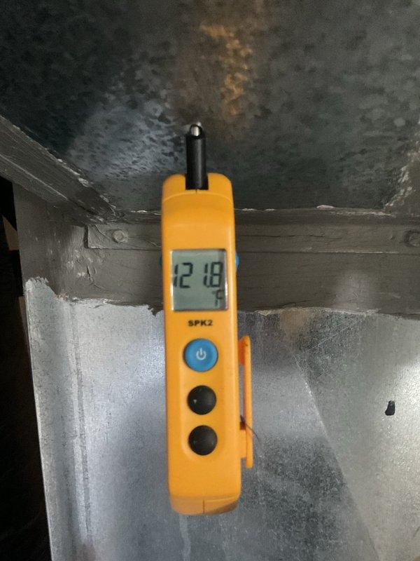 Completed comprehensive MVP maintenance on furnace and air conditioning system. Performed thorough inspection of heating components including burner assembly, ignition chamber, gas valve, blower motor, and all electrical connections. Verified proper flame operation with visible blue flame indicators and tested system controls for safe operation. Measured and recorded temperature differential readings at 12.18°F to confirm adequate heat exchange performance. All components found operating within manufacturer specifications with proper wire management and secure mounting throughout the unit.