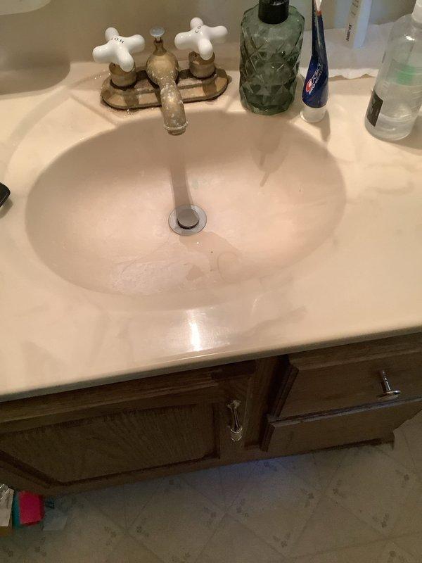 Responded to service call for bathroom sink not draining properly. Upon inspection, assessed the P-trap assembly and drain lines beneath the vanity. Cleared obstruction from the drain system, restored proper water flow, and verified sink drainage was functioning correctly. Tested fixture operation to ensure complete resolution of the clogging issue.