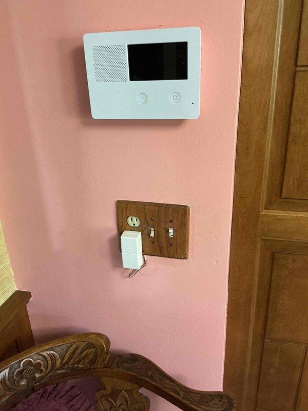 Responded to customer concern regarding sparking at light bulb socket when wall switch is activated. Inspected electrical panel and branch circuit wiring in basement mechanical room. Verified proper circuit breaker operation and panel connections. Examined wall switch and receptacle combination with wooden cover plate. Identified loose connection at socket terminal causing arcing condition. Tightened all terminal connections, verified proper grounding, and tested switch operation under load to confirm sparking issue was resolved and circuit functioning safely.