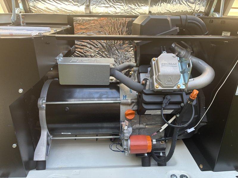 Performed scheduled maintenance on Generac generator system and investigated reported indicator light issue displaying half yellow/half green status. Inspected generator mechanical components, electrical connections, and GenTight inlet box installation, verified proper operation of all systems, and addressed the solid green and gold light condition previously noted.
