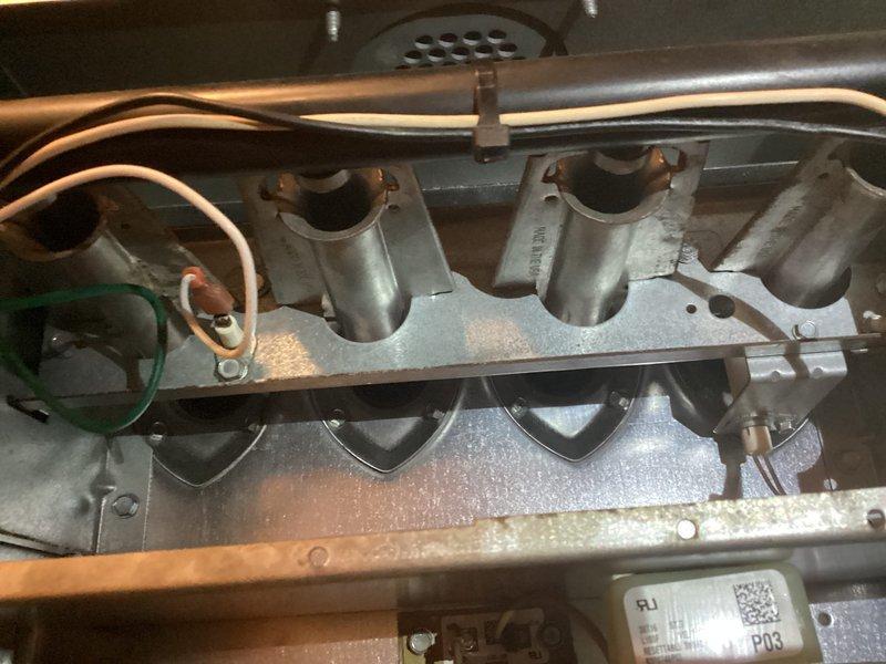 Completed comprehensive heating and cooling maintenance visit for MVP customer. Inspected and serviced 14-year-old gas furnace and 11-year-old air conditioning system. Examined burner assembly, heat exchanger access, gas manifold, and copper gas lines for proper operation and safety. Evaluated outdoor condenser unit, noting significant accumulation of debris and dirt on exterior fins requiring attention. Documented equipment condition through photographs showing burner compartment components and outdoor unit status. Both systems operational at time of inspection, though outdoor unit shows signs of reduced efficiency due to debris buildup on condenser coils.