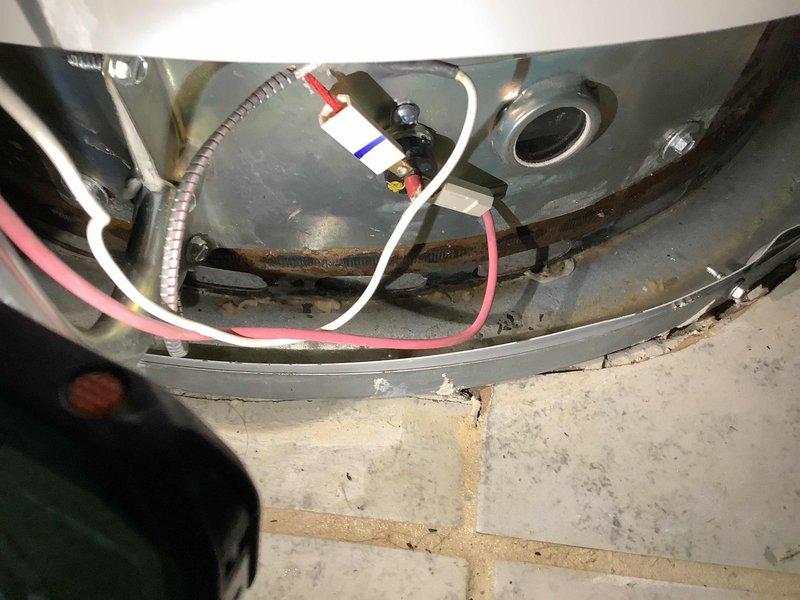 Responded to service call for 7-year-old natural gas tanked water heater with pilot light that would not remain lit. Upon inspection, found thermocouple assembly showing signs of corrosion and deterioration, along with significant rust buildup on internal components and burner chamber. Tested gas flow and pilot assembly operation, confirming thermocouple failure preventing proper flame sensing. Replaced defective thermocouple, cleaned pilot orifice and burner assembly, and removed rust deposits from internal brackets and housing. Verified proper pilot ignition, flame characteristics, and main burner operation. Unit tested and confirmed operational with pilot remaining lit and water heater cycling properly.