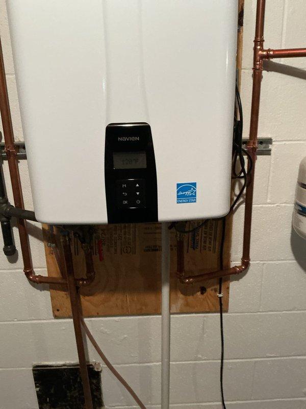 Replaced two upstairs toilets with customer-supplied fixtures, ensuring proper wax ring seals, water supply connections, and secure mounting. Performed descaling service on 2-year-old Navien tankless water heater by flushing unit with descaling solution to remove mineral buildup and restore optimal heating efficiency. All fixtures tested for proper operation and verified leak-free connections upon completion.