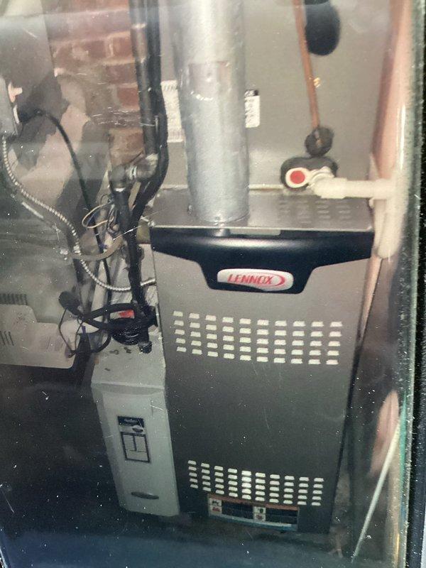 Responded to no cooling call on 8-year-old Lennox HVAC system. Upon arrival, confirmed blower motor was not operating. Inspected furnace unit and associated electrical components including disconnect switch and circuit breaker panel. Verified power supply to unit was intact at exterior disconnect. Diagnosed blower motor failure preventing air circulation through the system. Replaced defective blower motor and tested system operation to ensure proper airflow and cooling function restored.