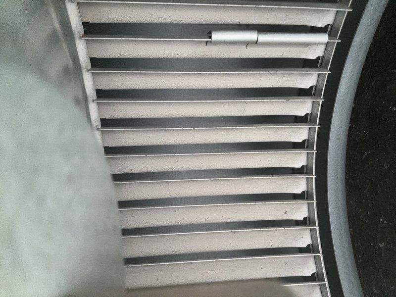 Completed routine MVP cooling maintenance visit on air conditioning system. Performed electrical diagnostics using clamp meter, recording voltage and amperage readings to verify proper system operation. Inspected exterior ventilation louvers and air intake components, confirming adequate airflow and structural integrity of all accessible equipment.