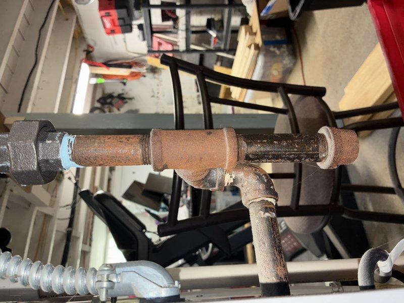 Completed MVP cooling maintenance visit on 22-year-old air conditioning system. Performed standard maintenance procedures including inspection of blower wheel assembly, which showed dust and debris accumulation on blades typical of seasonal operation. Observed significant rust and corrosion on overhead plumbing infrastructure associated with the system, indicating advanced age and environmental exposure consistent with the unit's service life. All routine maintenance tasks completed per MVP service protocol.
