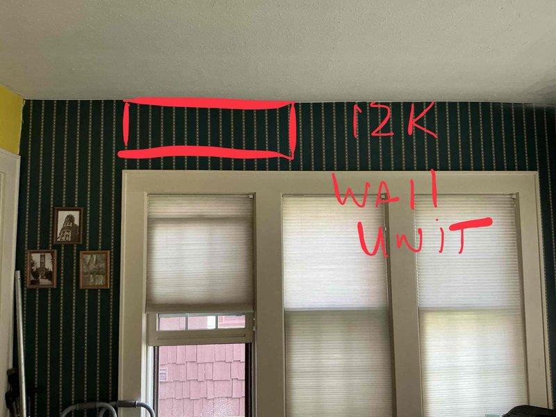 Completed on-site assessment for Mitsubishi ductless mini-split system installation in medium-sized residential property (1500-3000 sq.ft.). Evaluated two interior rooms for wall-mounted unit placement, identifying optimal locations for a 12K BTU unit in the first room and a 15K BTU unit in the second room. Documented existing wall conditions, measured placement areas, and confirmed specifications for three-zone ductless heating and cooling system configuration to meet the property's climate control requirements.