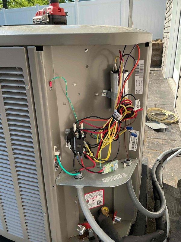 Completed first-year maintenance on 1-year-old air conditioning system during scheduled 8am BS-MVP cooling visit. Performed comprehensive inspection of outdoor condenser unit, accessed electrical control panel to verify proper wiring connections and component operation, and conducted standard preventive maintenance procedures on all accessible system components.