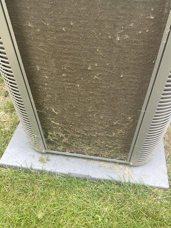 Completed preventative maintenance tune-up on 4-year-old residential air conditioning system. Inspected electrical disconnect box, verified proper operation, and thoroughly cleaned heavily soiled condenser coil which had accumulated significant dirt, dust, and debris buildup that was restricting airflow. System tested and confirmed operational following service.