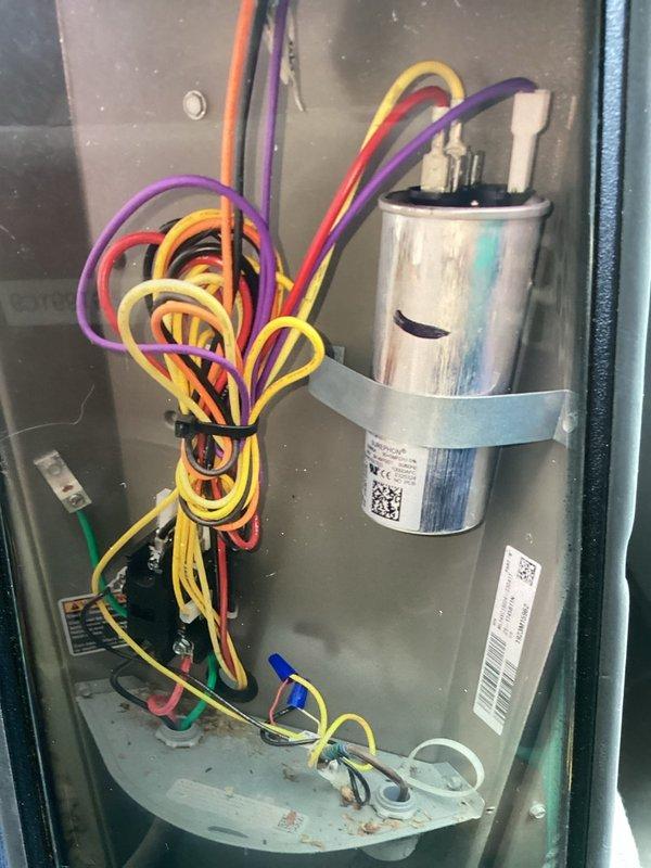 Performed annual maintenance on one-year-old air conditioning system. During inspection, discovered significant frost accumulation on evaporator coil and refrigerant lines, indicating potential airflow restriction or refrigerant charge issue. Documented electrical components including capacitor and control wiring, all connections secure and within normal operating parameters. Evaluated ductwork system for cleaning requirements and noted findings for customer review.