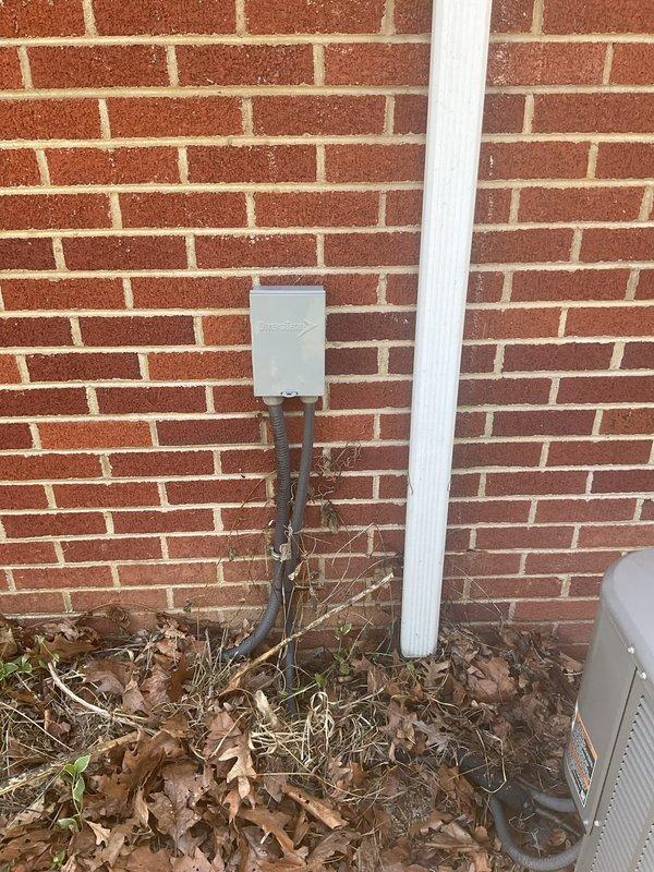 Replaced outdoor electrical service disconnect for HVAC system. Removed existing weathered disconnect switch mounted on exterior brick wall and installed new unit with proper conduit connections. All electrical connections verified and system tested for proper operation.