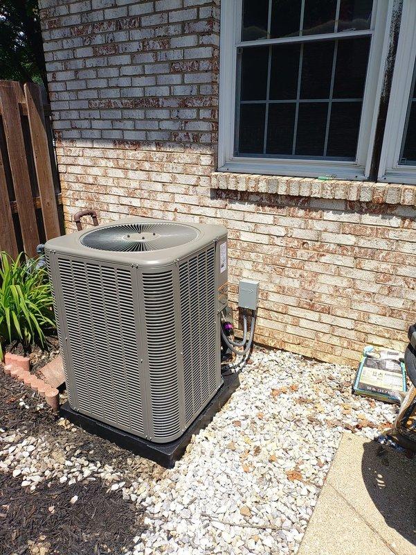 Completed full HVAC system installation including 80% efficiency furnace and air conditioning condenser unit. Installed new outdoor condenser on gravel pad with proper electrical connections and conduit routing. Replaced severely corroded fuse assembly and electrical disconnect panel that showed extensive rust deterioration on mounting surface. Verified all electrical connections, tested system operation, and confirmed proper airflow and cooling performance.