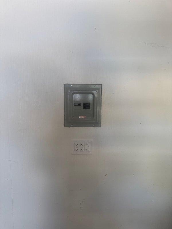 Installed an 8-circuit, 50-amp sub-panel with proper grounding and bonding, complete with circuit breakers and appropriate gauge conductors. Ran and terminated a new dedicated 120V, 20A branch circuit for first-floor use, including installation of receptacle outlets. All work completed to code specifications with proper wire sizing, panel mounting, and secure connections throughout the electrical distribution system.
