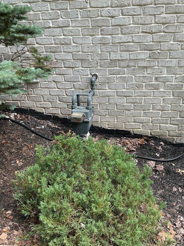 Responded to service call for 16-year-old Generac generator with reported low oil pressure issue. Upon arrival, performed comprehensive diagnostic evaluation of the unit including visual inspection, oil level verification, and pressure system assessment. Documented existing conditions with measurements and photographs of the generator installation at the exterior foundation location. Customer was advised that a detailed estimate for necessary repairs would be provided following the diagnostic evaluation.