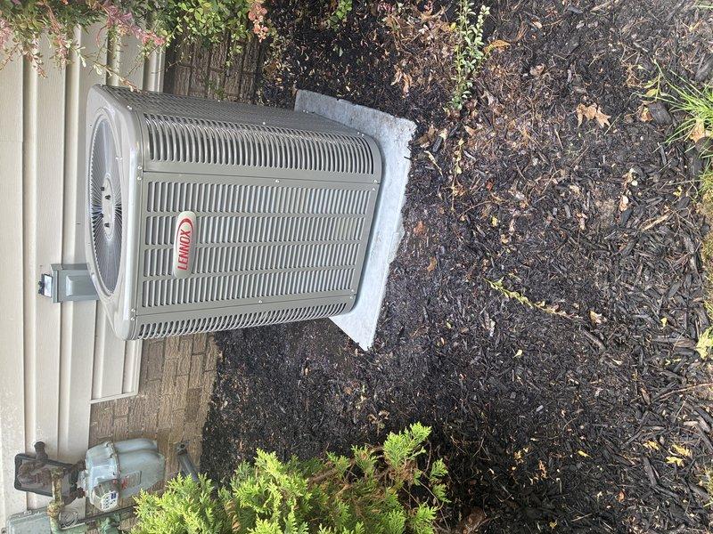 Completed MVP cooling maintenance visit on Lennox air conditioning system. Performed visual inspection of outdoor condenser unit, verified proper installation on concrete pad, and documented equipment condition with photos. Unit operating in standard condition with all components accessible and functioning as designed.