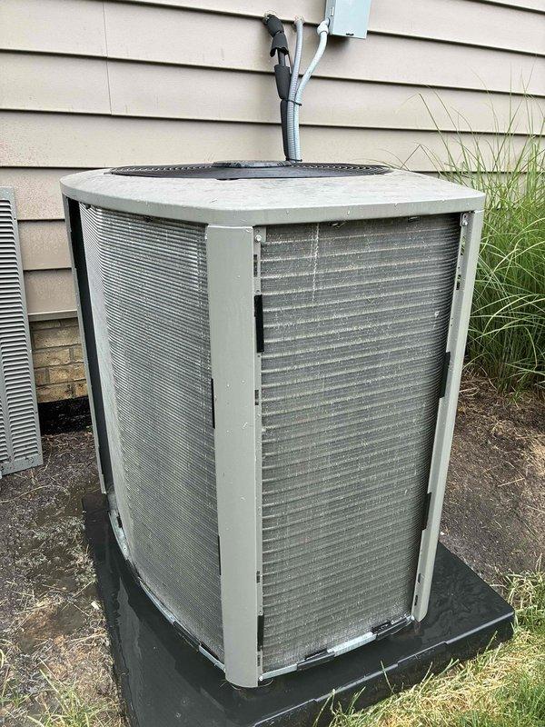Completed preventive maintenance cooling visit on a 2-year-old residential air conditioning system. Performed comprehensive system inspection including visual assessment of outdoor condensing unit, verified proper operation of condenser fan, checked refrigerant line connections, and evaluated overall equipment condition. Unit found operating within normal parameters with typical exterior weathering; cooling fins showing minor dust accumulation but remain structurally intact with adequate airflow capacity.
