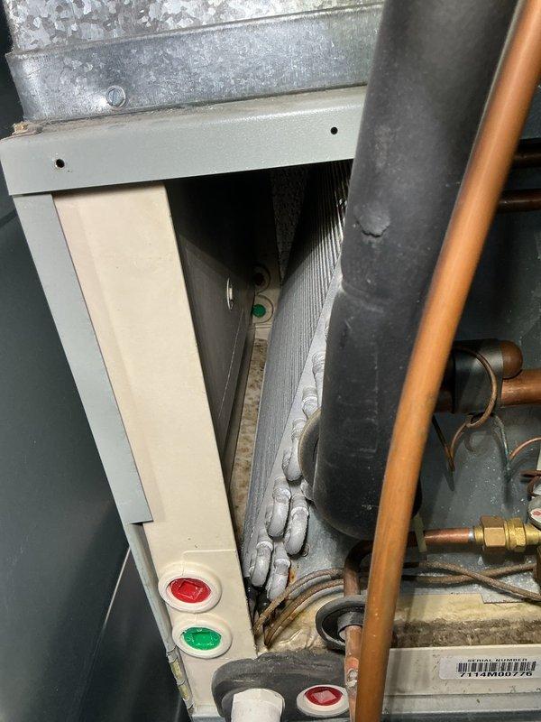 Completed scheduled MVP cooling maintenance visit on 11-year-old system. Performed comprehensive inspection of indoor air handler unit, examining all accessible components including evaporator coil, condensate drainage system, and electrical controls. Verified proper operation of all indicator lights and control panel functionality. Inspected refrigerant line connections, copper tubing, and insulation integrity throughout the system. Measured and recorded system voltage at 24.29V using clamp meter to confirm proper electrical supply to outdoor condensing unit. All components found operating within normal parameters with no immediate service needs identified.