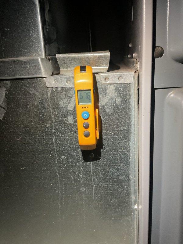Completed scheduled MVP cooling maintenance visit. Performed system diagnostics using digital meter, recording supply air temperature of 57°F at ductwork. Inspected roof-mounted ventilation components and noted weathering and debris accumulation on exterior vent cover and surrounding roofing area. System operational and cooling properly at time of inspection.