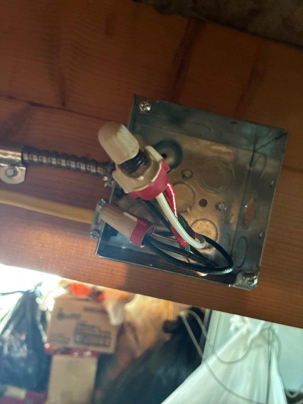 Responded to service call for electrical issue affecting air conditioning system. Upon arrival, performed comprehensive evaluation of electrical infrastructure serving the AC unit. Inspection revealed compromised wiring connections within junction box mounted in structural framing. Found multiple conductors requiring proper termination and securing. Rewired junction box connections using appropriate wire nuts, ensuring all hot, neutral, and ground conductors were properly terminated per NEC standards. Secured all wiring with cable management devices to prevent future strain or disconnection.

External inspection of electrical service revealed meter base and associated conduit system showing signs of age and weathering. Verified proper grounding and bonding at service entrance. Confirmed metallic conduit integrity despite surface corrosion. Tested all connections at meter base to ensure secure termination of service conductors. Verified proper operation of electrical service feeding AC 