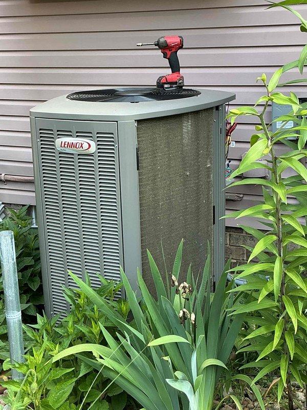 Completed preventive maintenance inspection on Lennox air conditioning condenser unit. Connected Fieldpiece digital manifold gauges to measure refrigerant pressures and system performance parameters, verifying proper operating conditions and refrigerant charge levels. All system diagnostics indicated normal operation with no issues identified during the routine maintenance visit.