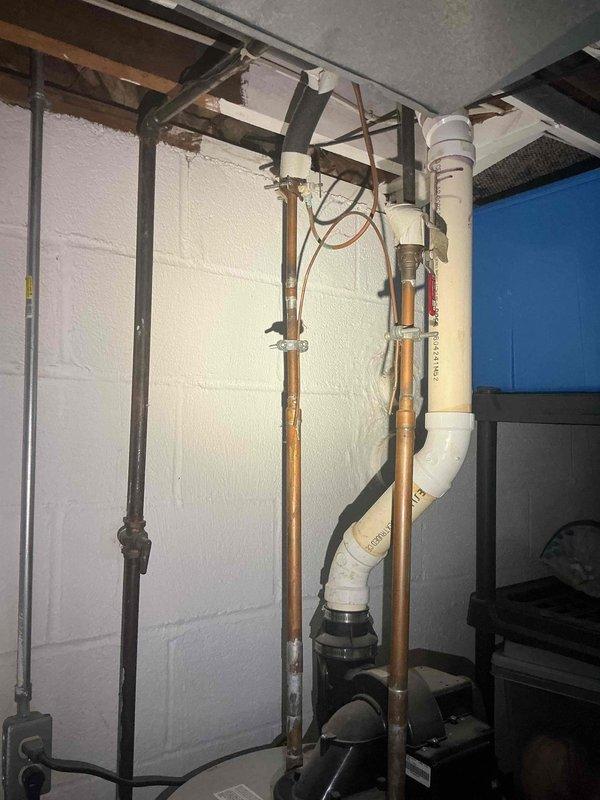 Installed new GFCI outlet in basement utility area, troubleshot and repaired non-functioning GFCI outlet in kitchen, and installed proper grounding for electrical line near water heater to bring property into compliance with inspection requirements for sale.