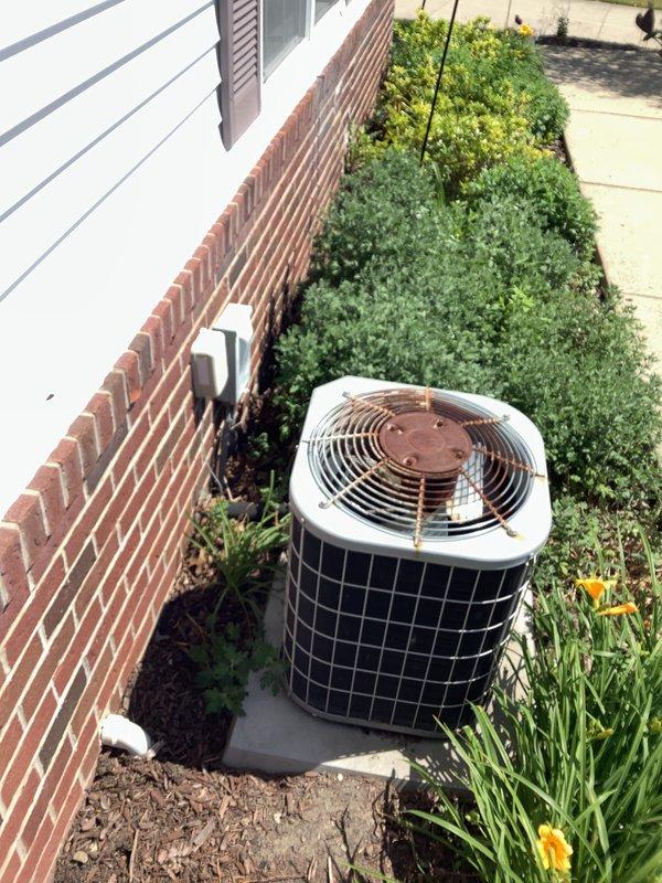 Completed estimate for replacement of 20+ year old central air conditioning system and furnace that have reached end of service life. Evaluated existing outdoor condenser unit and indoor air handler/furnace installation in basement, documented current equipment configuration including venting and condensate drainage systems. Provided replacement options for complete HVAC system upgrade to restore cooling and heating functionality to the home.