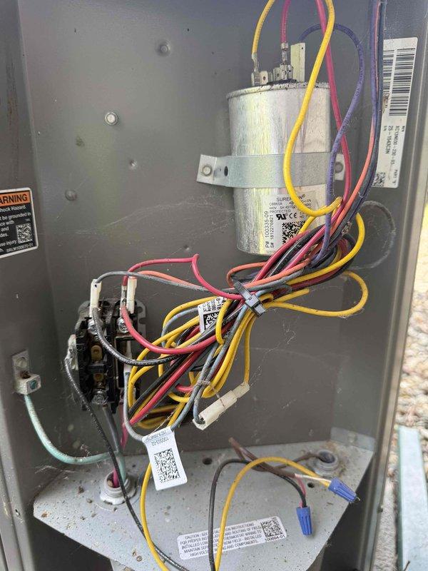 Completed MVP cooling maintenance visit on HVAC system. Performed comprehensive inspection of electrical components including capacitor, contactor, and associated wiring connections within control panel. Inspected cylindrical filter element showing normal dust accumulation consistent with operational use. All components photographed and documented with identification labels intact. System operational and ready for continued service.