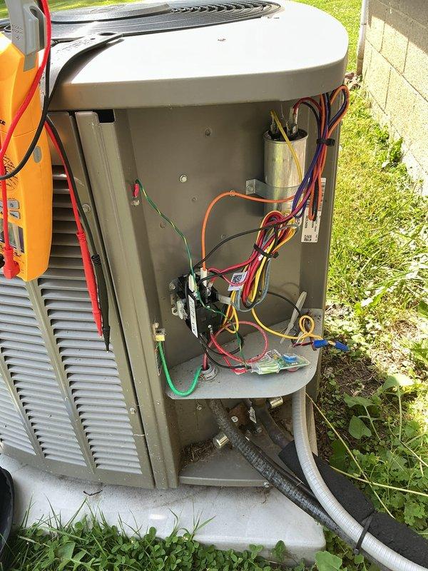 Responded to no cooling call on residential AC unit. Upon inspection, found faulty contactor preventing system from energizing. Removed and replaced defective contactor with new component, restored power to unit, and verified proper system operation with compressor and condenser fan running normally.