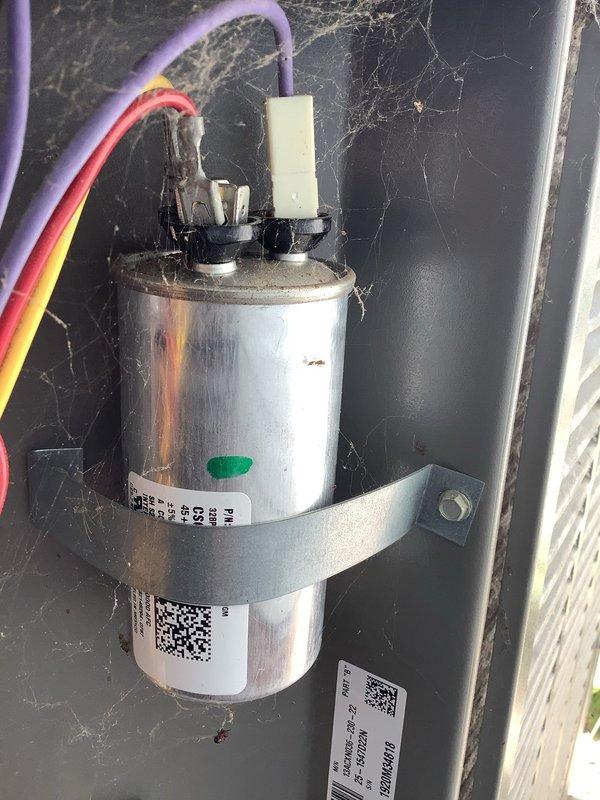 Responded to service call for non-operational condenser fan resulting in inadequate cooling on a three-year-old air conditioning unit. Upon inspection, diagnosed failed capacitor preventing fan motor operation. Replaced defective capacitor with manufacturer-specified component, restored proper electrical connections, and verified condenser fan operation. System tested successfully with normal cooling function restored.