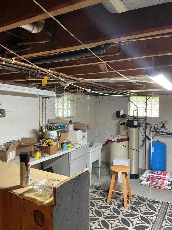 Completed electrical estimate for Generac generator installation at residential property. Assessed existing electrical panel configuration, load capacity, and available space in unfinished basement utility area for generator transfer switch integration. Documented current electrical infrastructure including main service panel with dual breaker columns and incoming service conductors. Evaluated optimal placement for automatic transfer switch and necessary electrical connections. Customer qualified for Generac 7-year extended warranty promotion (Code: 0035111499, valid through 09/02/2026). Provided comprehensive estimate for generator system installation including equipment specifications, transfer switch requirements, and electrical modifications needed to support backup power system.