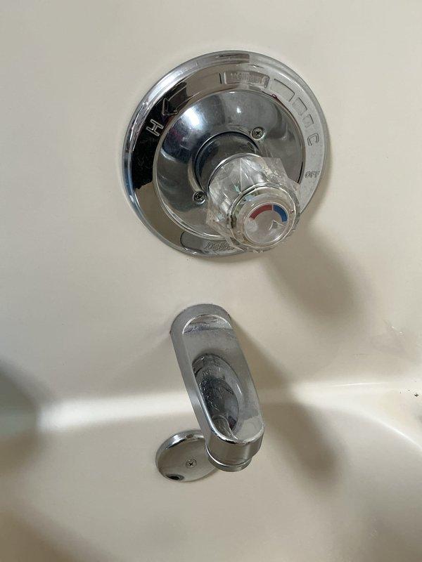 Responded to service call for two leaking shower fixtures and sewer odor emanating from bathroom shower drain. Inspected chrome-plated shower control valve and tub spout assembly, examined drain cover and trap system, and documented existing conditions. Identified potential issues with fixture seals and drain trap requiring further diagnostic work to resolve leaks and eliminate sewer gas infiltration.