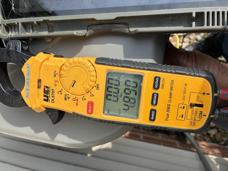 Completed MVP cooling maintenance visit on residential HVAC system. Performed comprehensive electrical diagnostics using digital clamp meter, measuring amperage draw and voltage readings on the condensing unit to verify proper compressor and fan motor operation. All electrical parameters tested within manufacturer specifications, confirming system is operating efficiently and safely for continued cooling performance.