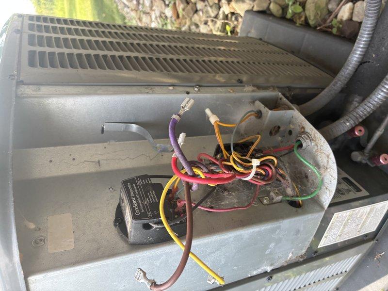 Responded to no cooling complaint. Upon arrival, found outdoor condensing unit not operating. Inspection revealed failed dual run capacitor with visible corrosion on terminals and mounting bracket. Removed defective capacitor, cleaned electrical connections, and installed new dual run capacitor. Verified proper voltage and amperage readings. Tested system operation and confirmed unit cooling properly with adequate airflow and temperature differential across evaporator coil.
