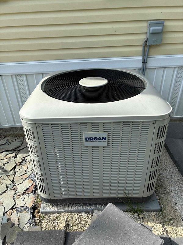 Completed preventive maintenance on residential Broan air conditioning system. Performed standard cooling season inspection including verification of system operation and temperature differential across the unit. Measured supply air temperature at 69°F using calibrated digital thermometer to confirm proper cooling output. Inspected outdoor condenser unit, noting satisfactory condition of fan assembly, louvered panels, and overall equipment housing. Unit operating within normal parameters with no issues identified requiring immediate attention.