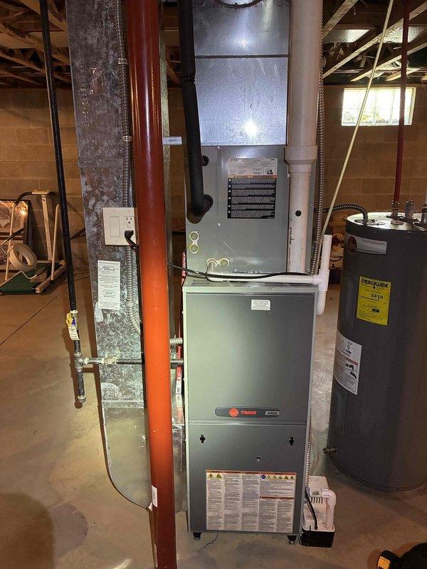 Completed MVP cooling maintenance visit on 7-year-old Trane system. Performed comprehensive inspection of air handler and control components, including examination of circuit boards, electrical connections, and blower assembly. All wiring connections verified secure, control boards functioning properly, and blower motor operating within normal parameters. System tested and confirmed operational for continued cooling season performance.