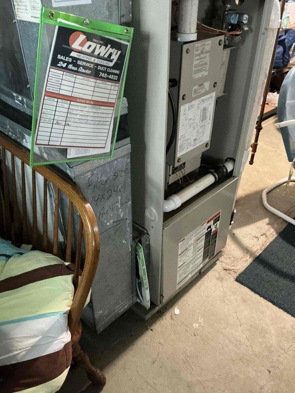 Conducted on-site evaluation of existing vertical furnace system in basement mechanical room to provide replacement estimate. Assessed current HVAC equipment configuration, ductwork connections, venting arrangement, and utility connections including gas lines, electrical service, and condensate drainage system to determine replacement specifications and installation requirements.