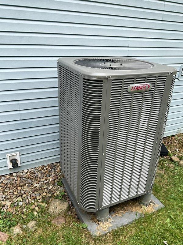 Completed MVP maintenance on Lennox air conditioning system. Upon arrival, found outdoor condenser unit with heavy accumulation of dirt, dust, and debris clogging the condenser coils, significantly restricting airflow and reducing heat transfer efficiency. Thoroughly cleaned condenser coils to remove buildup and restore proper airflow through heat exchange surfaces. Inspected unit for proper operation and verified system performance following maintenance procedures.